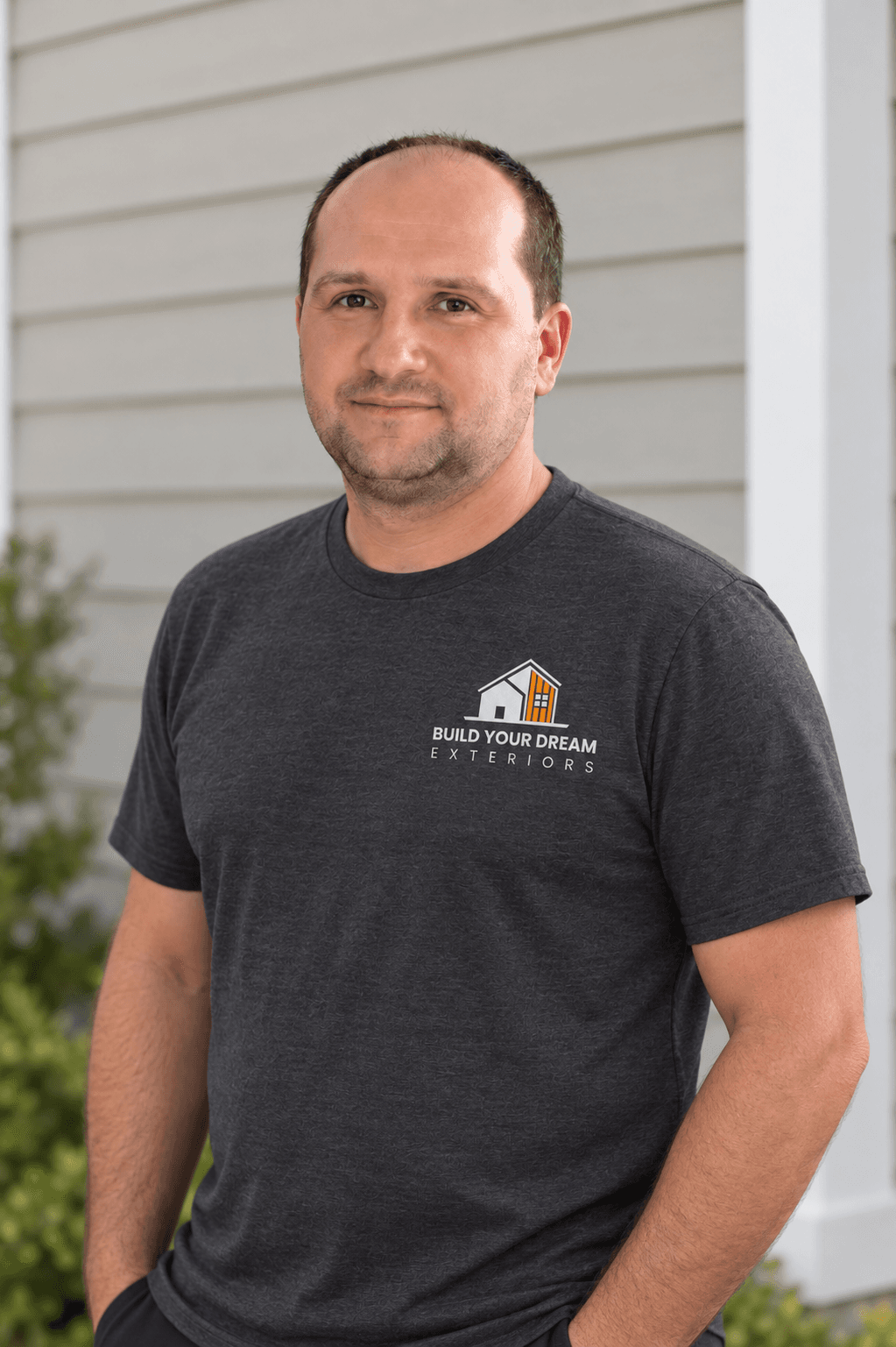 Roman Tomilovych, owner of Build Your Dream and licensed siding and deck contractor